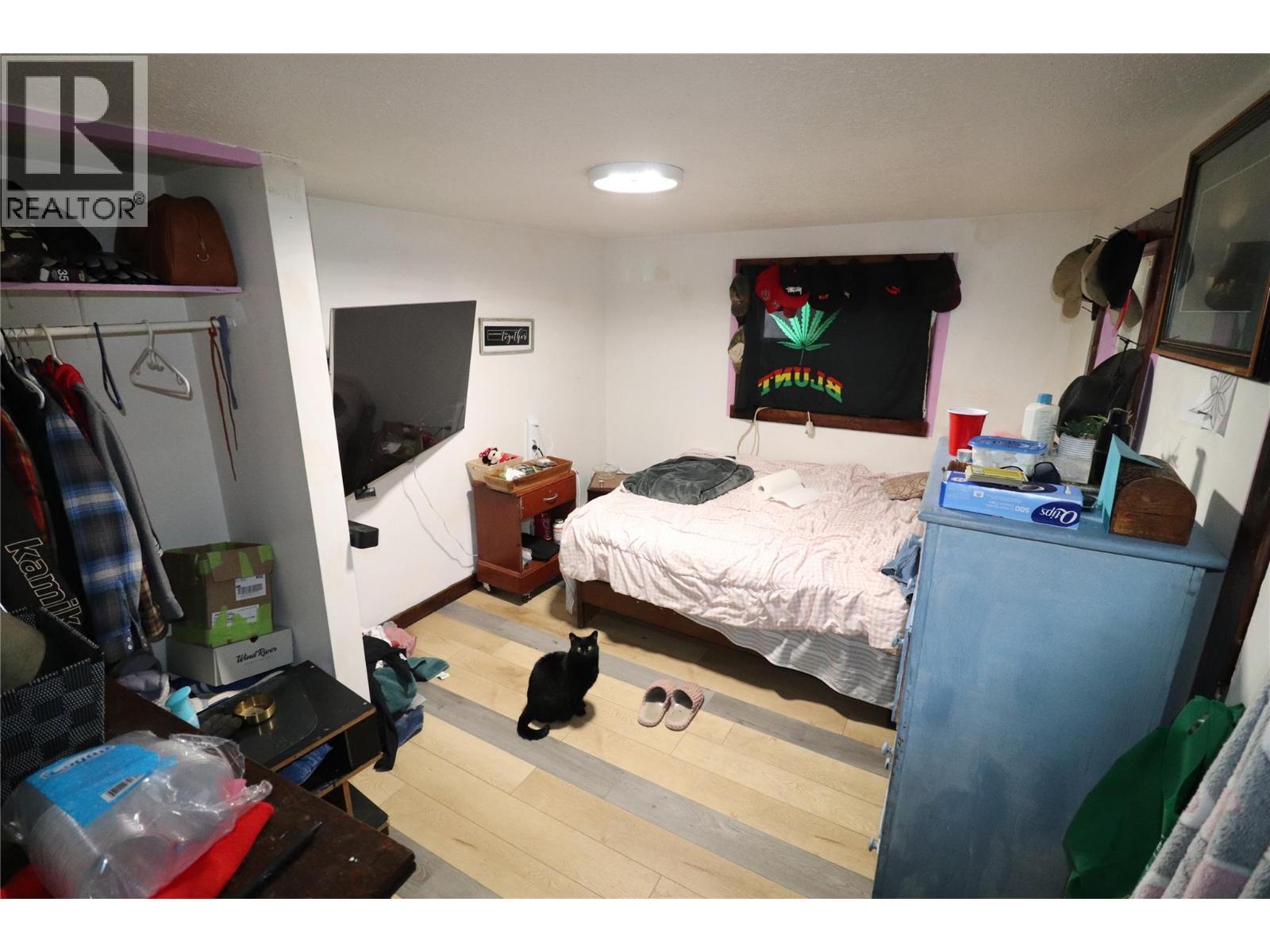 First house - 1381 3B Highway, Warfield, BC - Indoor Photo Showing Bedroom