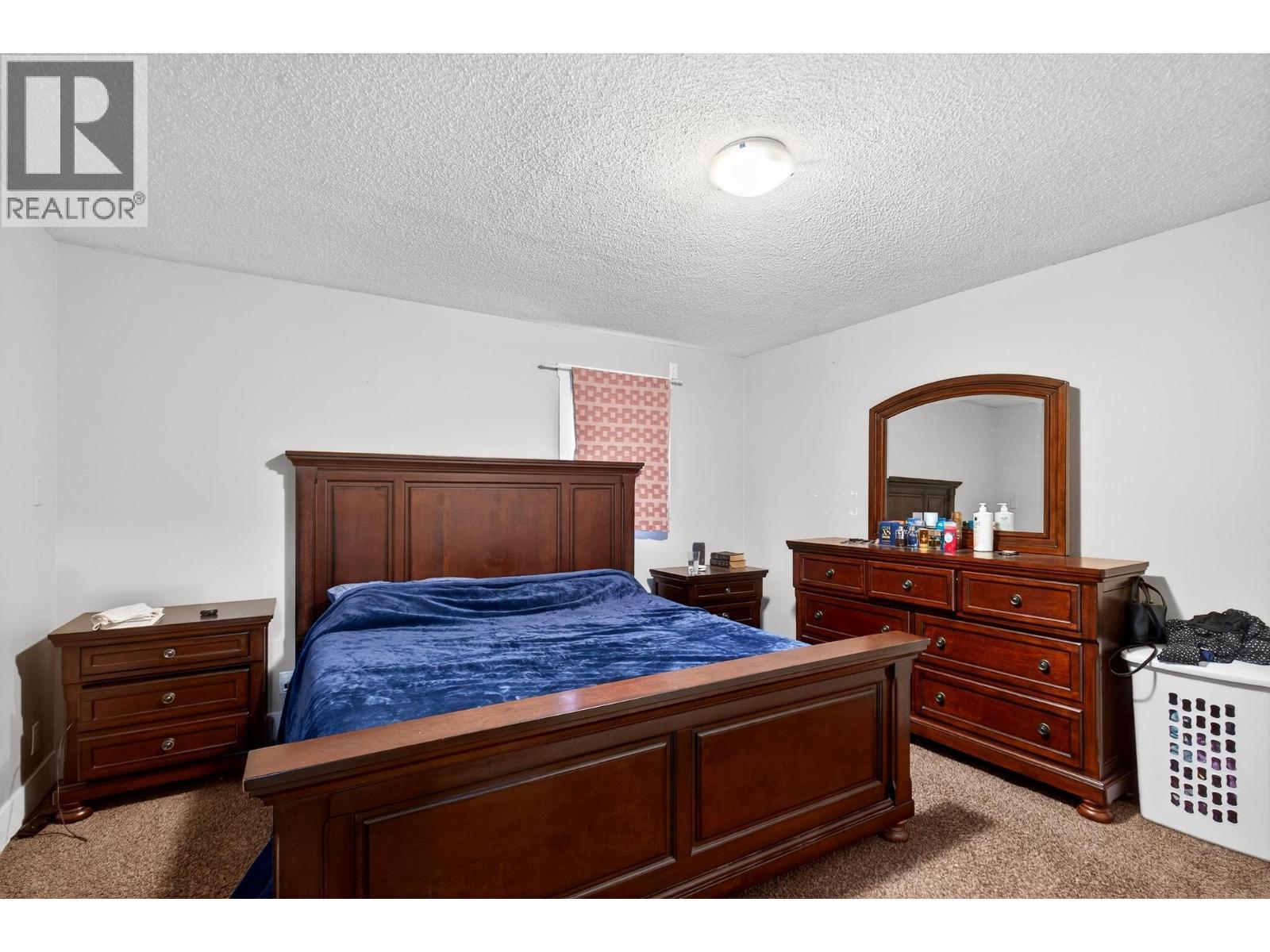 Unit 1 - 260 Ponto Road, Kelowna, BC - Indoor Photo Showing Bedroom