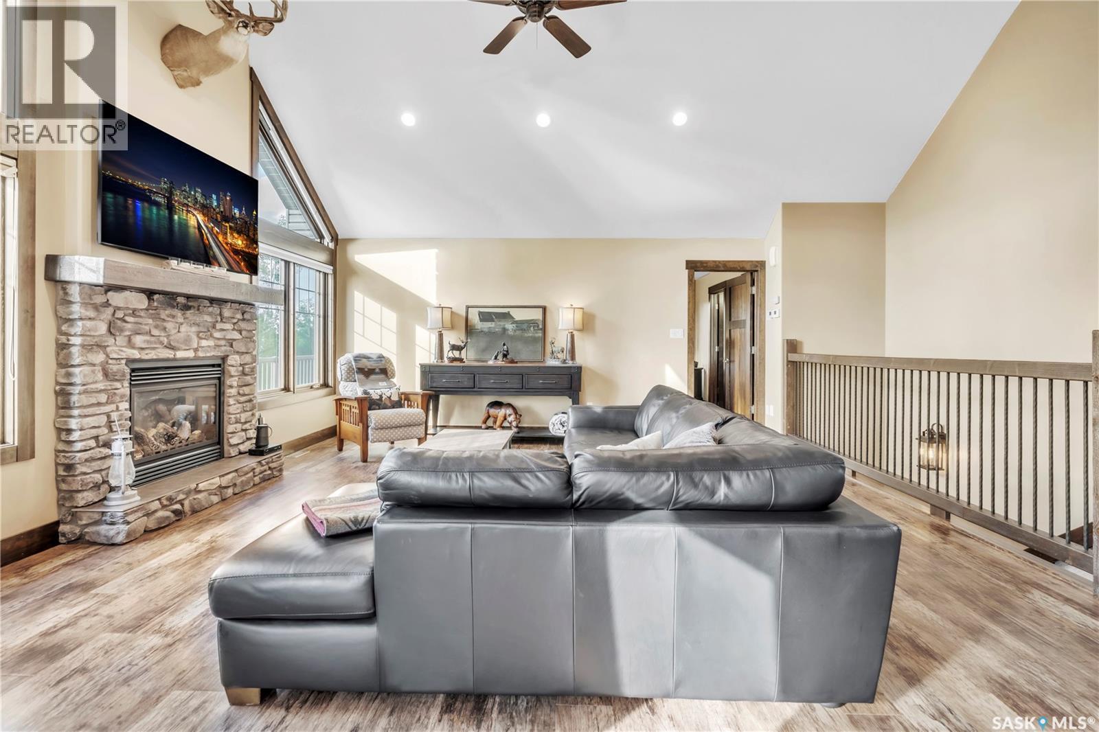 609 Cedar Close, Beaver River Rm No. 622, SK - Indoor Photo Showing Living Room With Fireplace