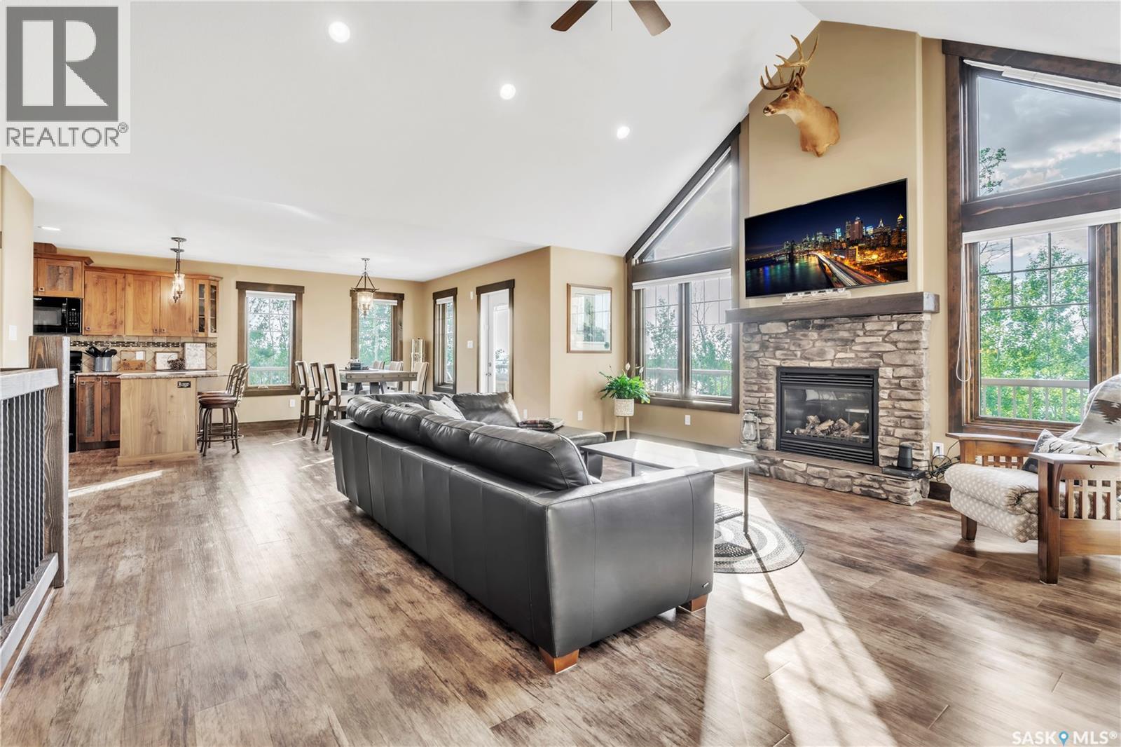 609 Cedar Close, Beaver River Rm No. 622, SK - Indoor Photo Showing Living Room With Fireplace