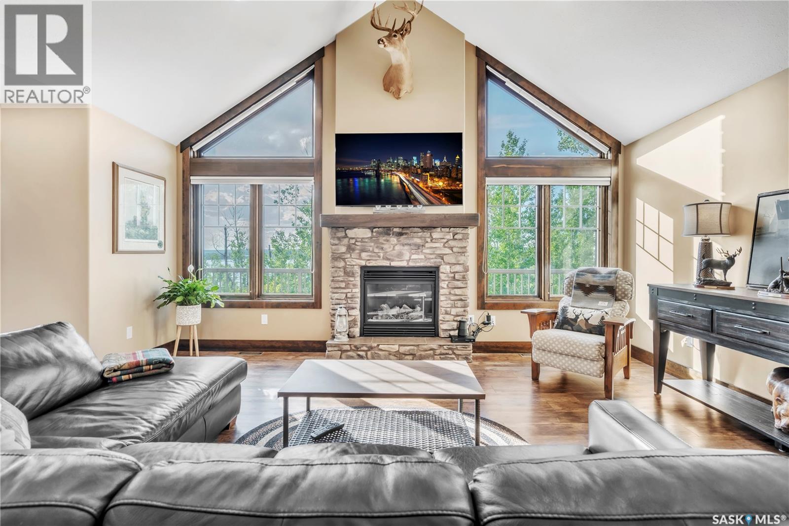 609 Cedar Close, Beaver River Rm No. 622, SK - Indoor Photo Showing Living Room With Fireplace