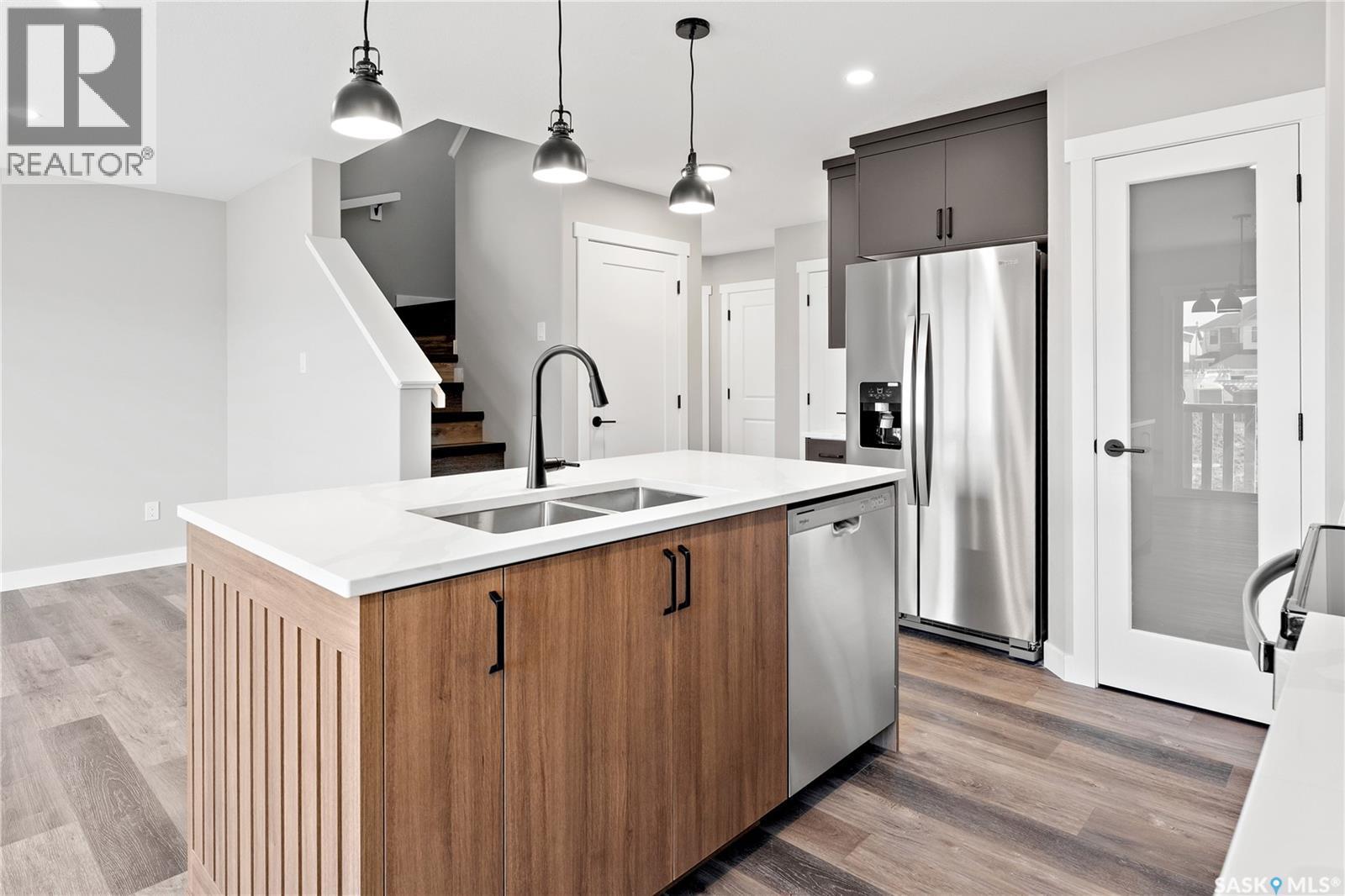 3072 Dumont Way, Regina, SK - Indoor Photo Showing Kitchen With Stainless Steel Kitchen With Double Sink With Upgraded Kitchen