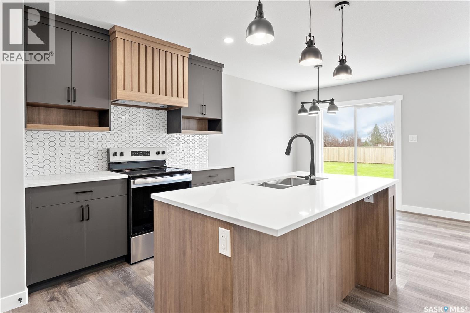 3072 Dumont Way, Regina, SK - Indoor Photo Showing Kitchen With Double Sink