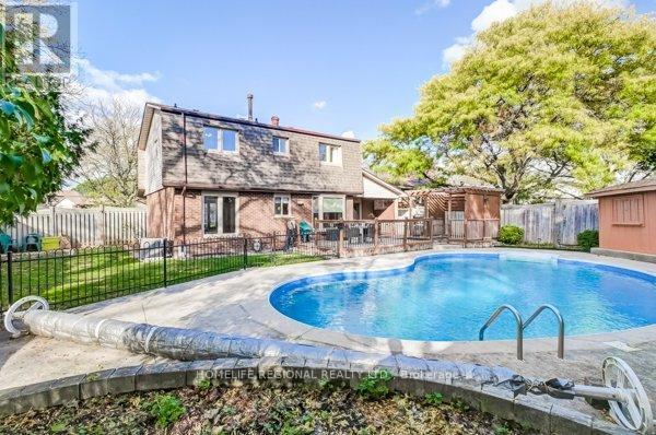 2557 Brasilia Circle, Mississauga, ON - Outdoor With In Ground Pool With Backyard