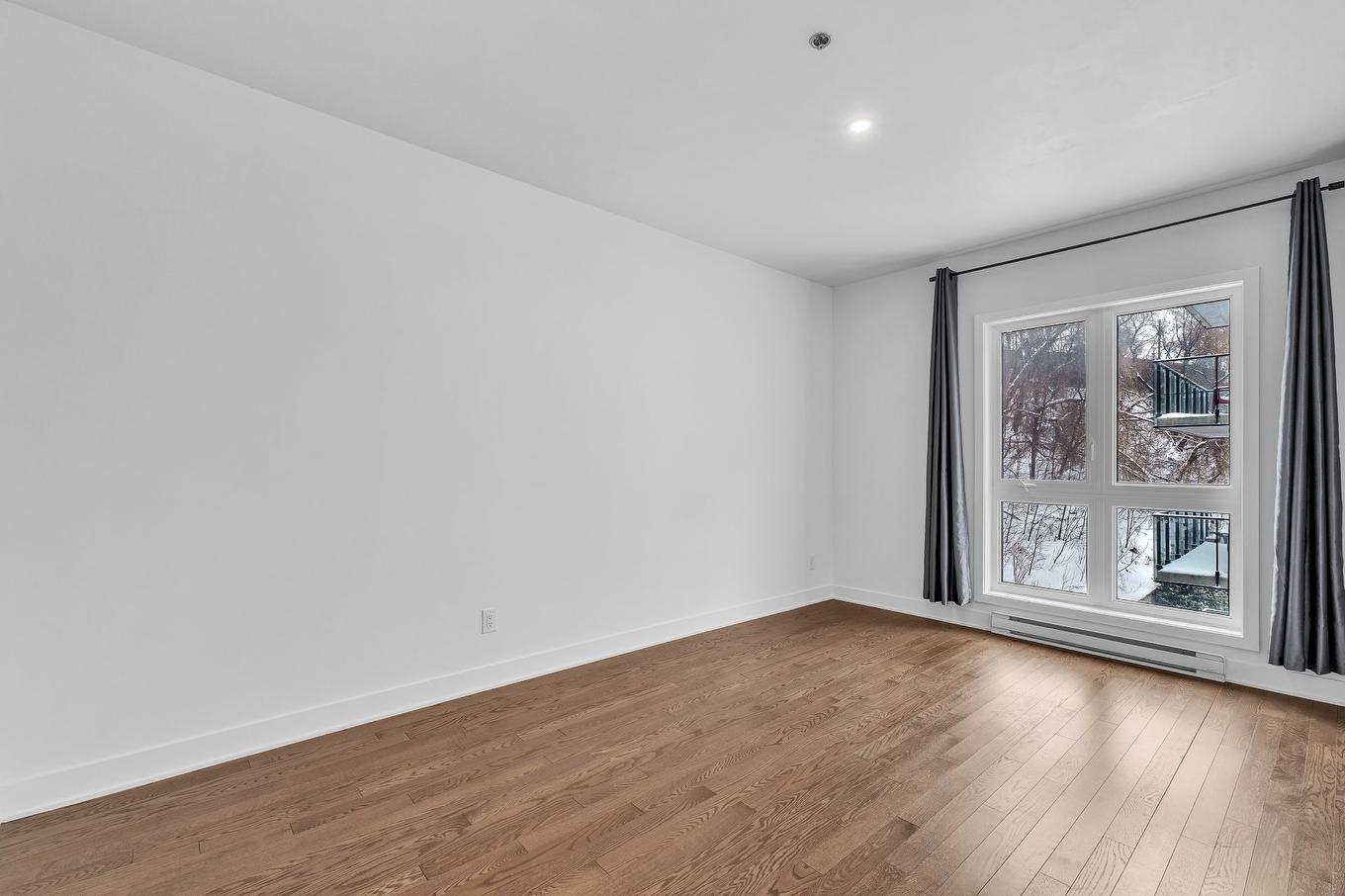 Living room - 205-191 Av. Brock S., Montréal-Ouest, QC - Indoor Photo Showing Other Room