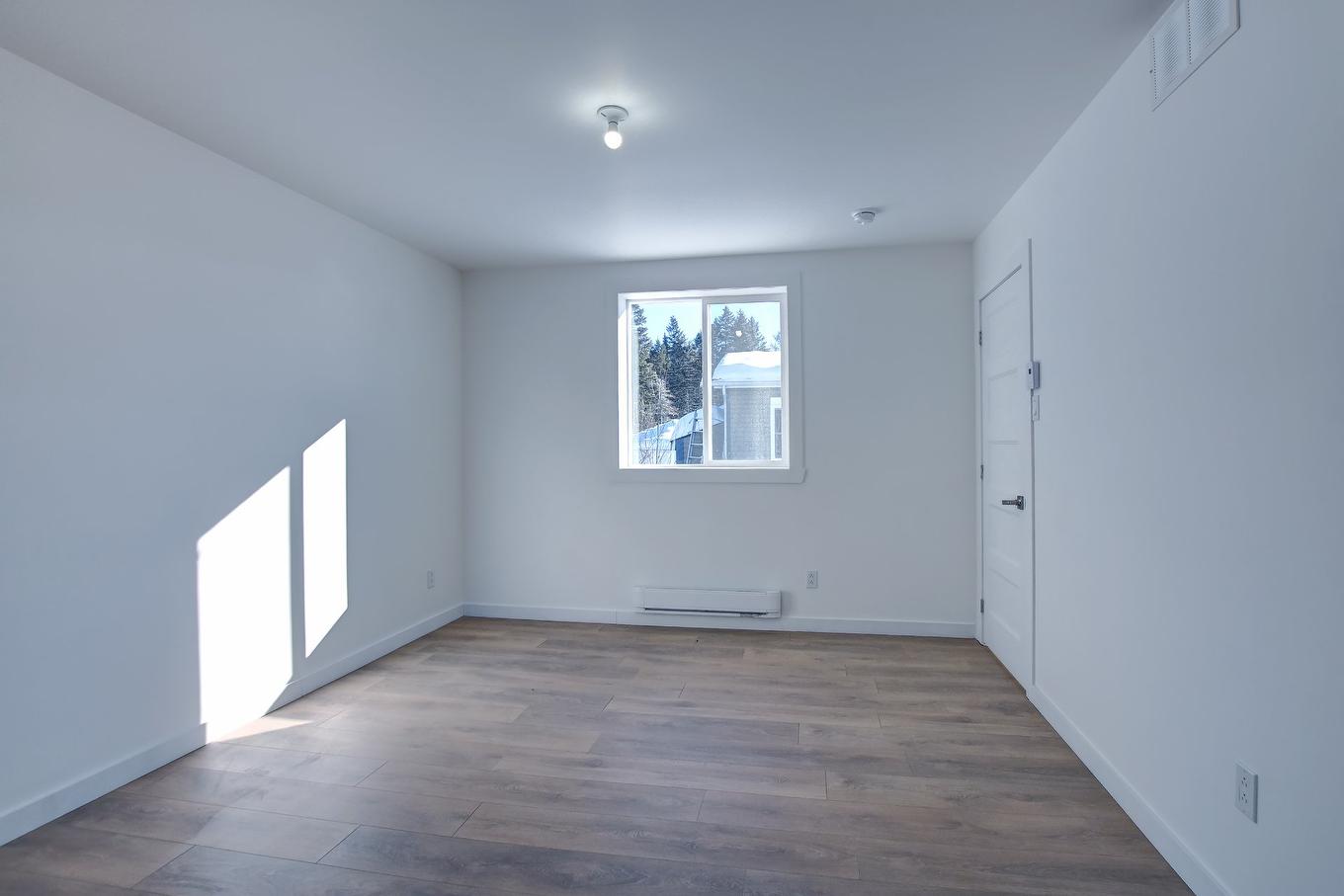 Chambre à coucher principale - 45 Rue Des Pionniers, Saint-Côme, QC - Indoor Photo Showing Other Room