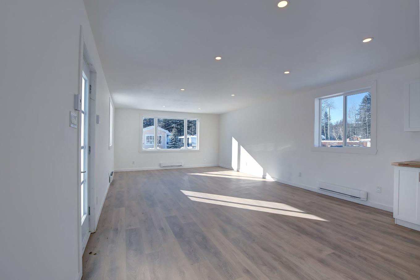 Salon - 45 Rue Des Pionniers, Saint-Côme, QC - Indoor Photo Showing Other Room