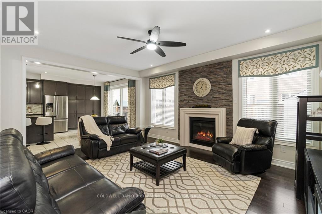 4 Macbean Crescent, Hamilton, ON - Indoor Photo Showing Living Room With Fireplace