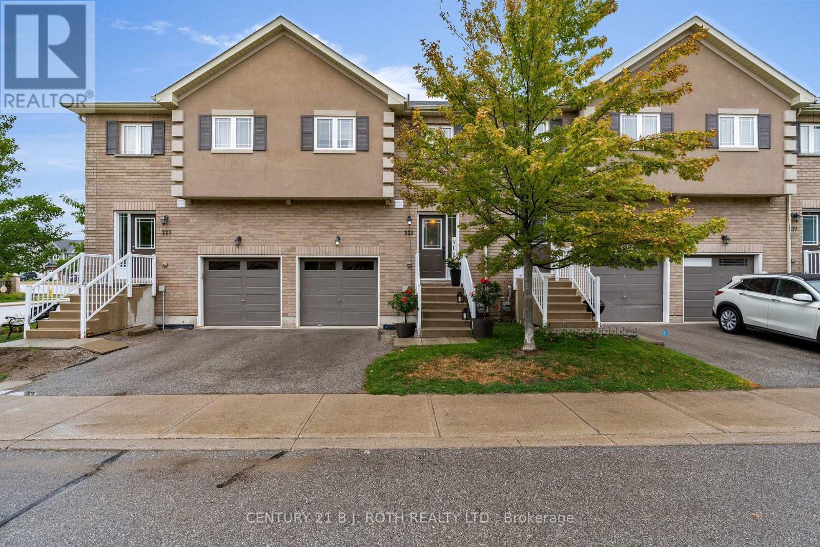 Back of home with parking - 221 Harvie Road, Barrie, ON - Outdoor With Facade
