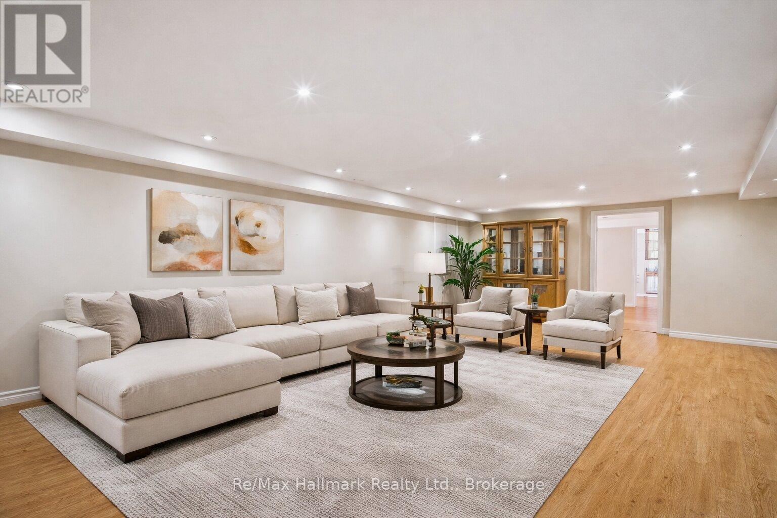 Rec room ( virtually staged) - 232 Eighth Road E, Hamilton, ON