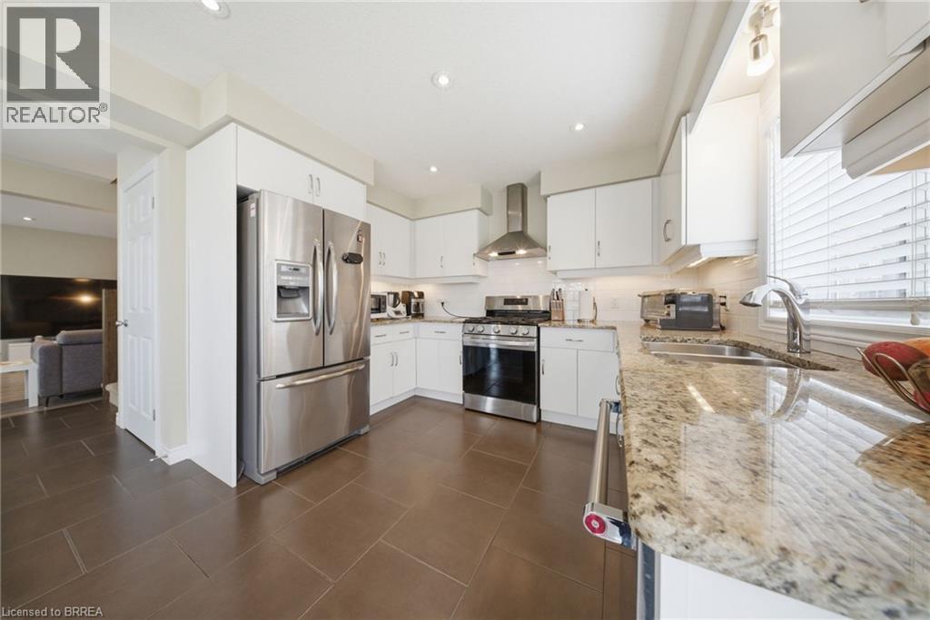 1220 Riverbend Road Unit# 105, London, ON - Indoor Photo Showing Kitchen With Stainless Steel Kitchen With Double Sink With Upgraded Kitchen