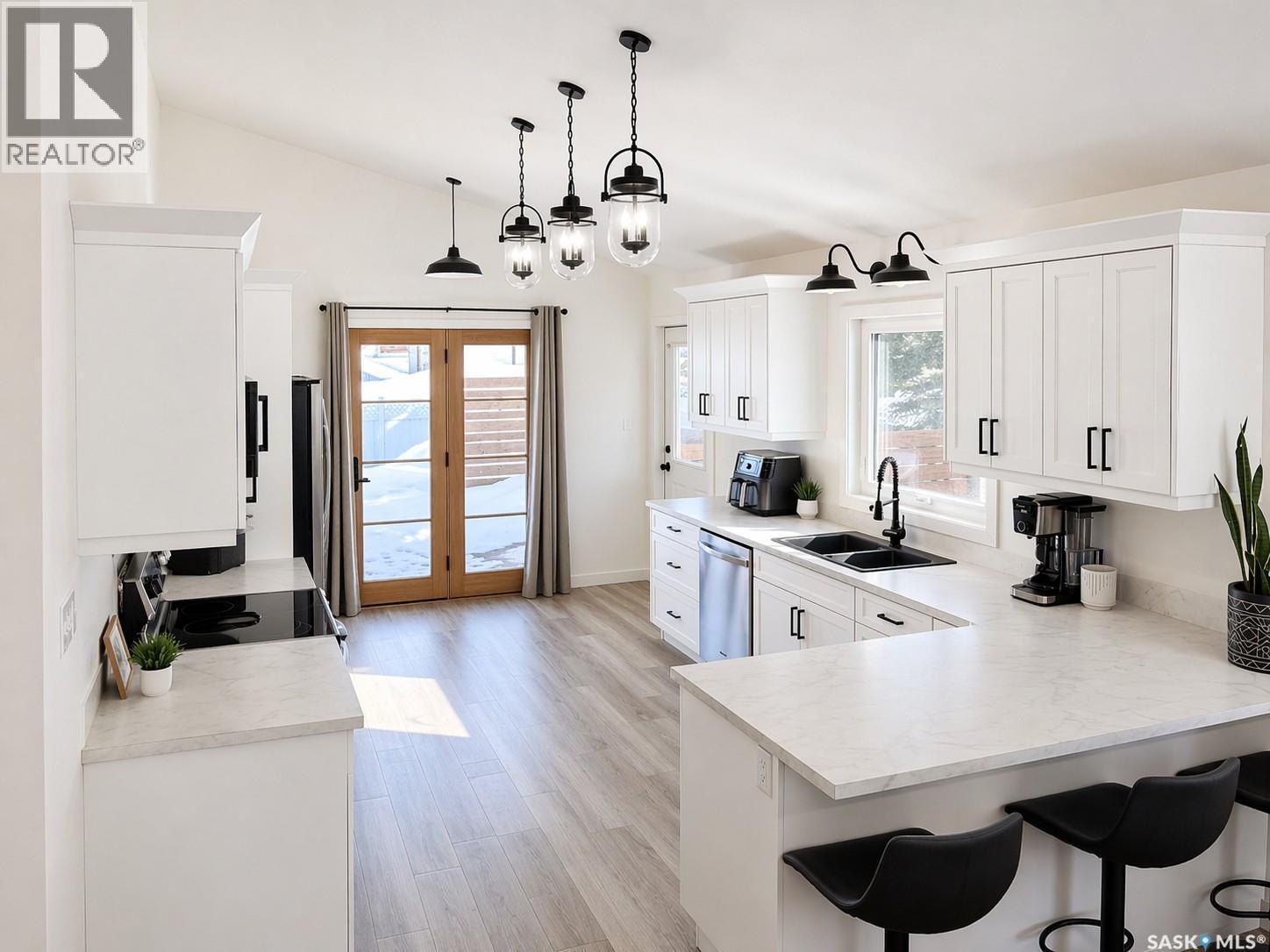 104 Parkview Place, Shellbrook, SK - Indoor Photo Showing Kitchen With Double Sink