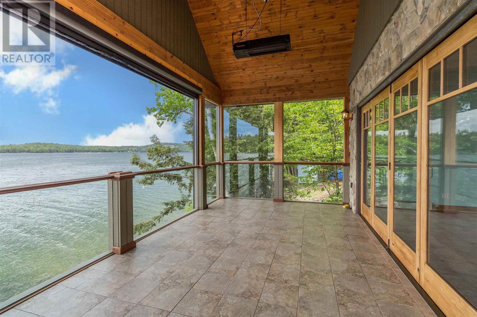 400 Mccarrel Lake Rd, Echo Bay, ON - Outdoor With Body Of Water With Deck Patio Veranda With Exterior