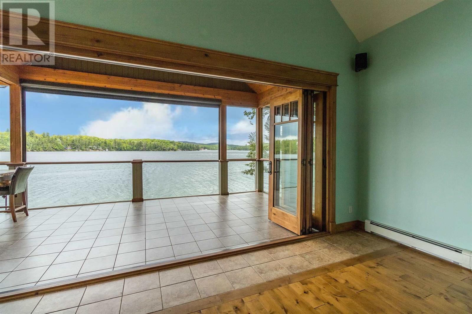 400 Mccarrel Lake Rd, Echo Bay, ON - Indoor Photo Showing Other Room With Body Of Water