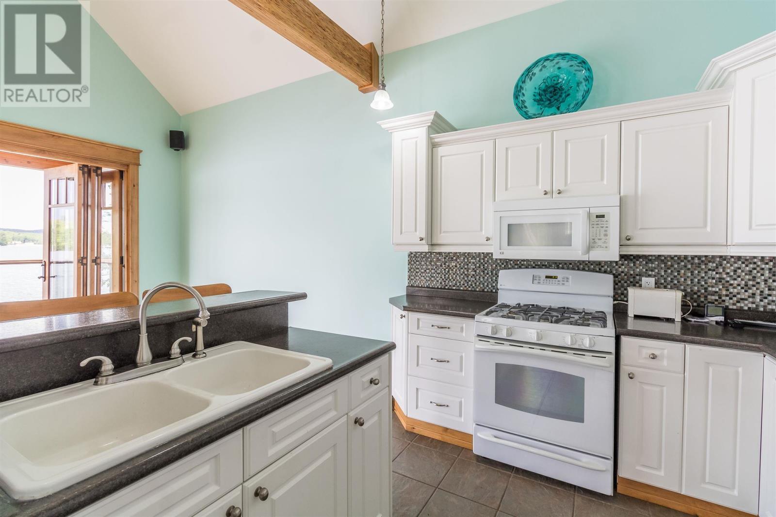 400 Mccarrel Lake Rd, Echo Bay, ON - Indoor Photo Showing Kitchen With Double Sink