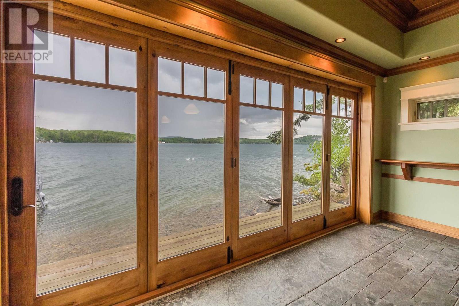 400 Mccarrel Lake Rd, Echo Bay, ON - Indoor Photo Showing Other Room With Body Of Water