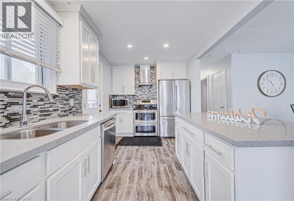 141 Mooregate Crescent, Kitchener, ON - Indoor Photo Showing Kitchen With Stainless Steel Kitchen With Double Sink With Upgraded Kitchen