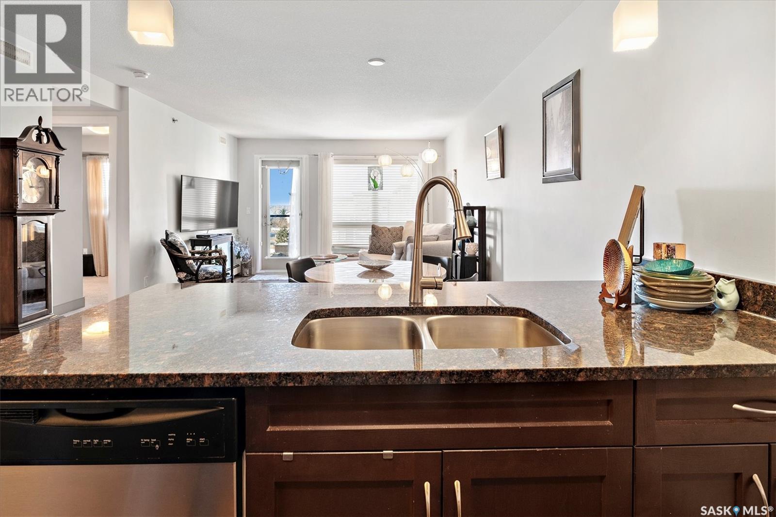 331 121 Willowgrove Crescent, Saskatoon, SK - Indoor Photo Showing Kitchen With Double Sink