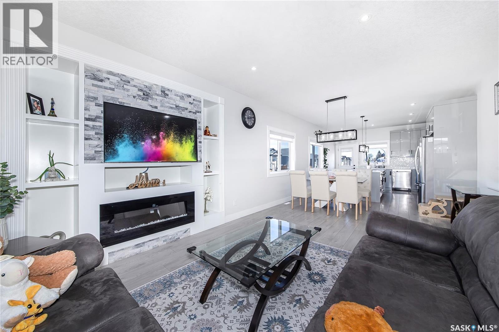 123 Mcarthur Lane, Saskatoon, SK - Indoor Photo Showing Living Room With Fireplace