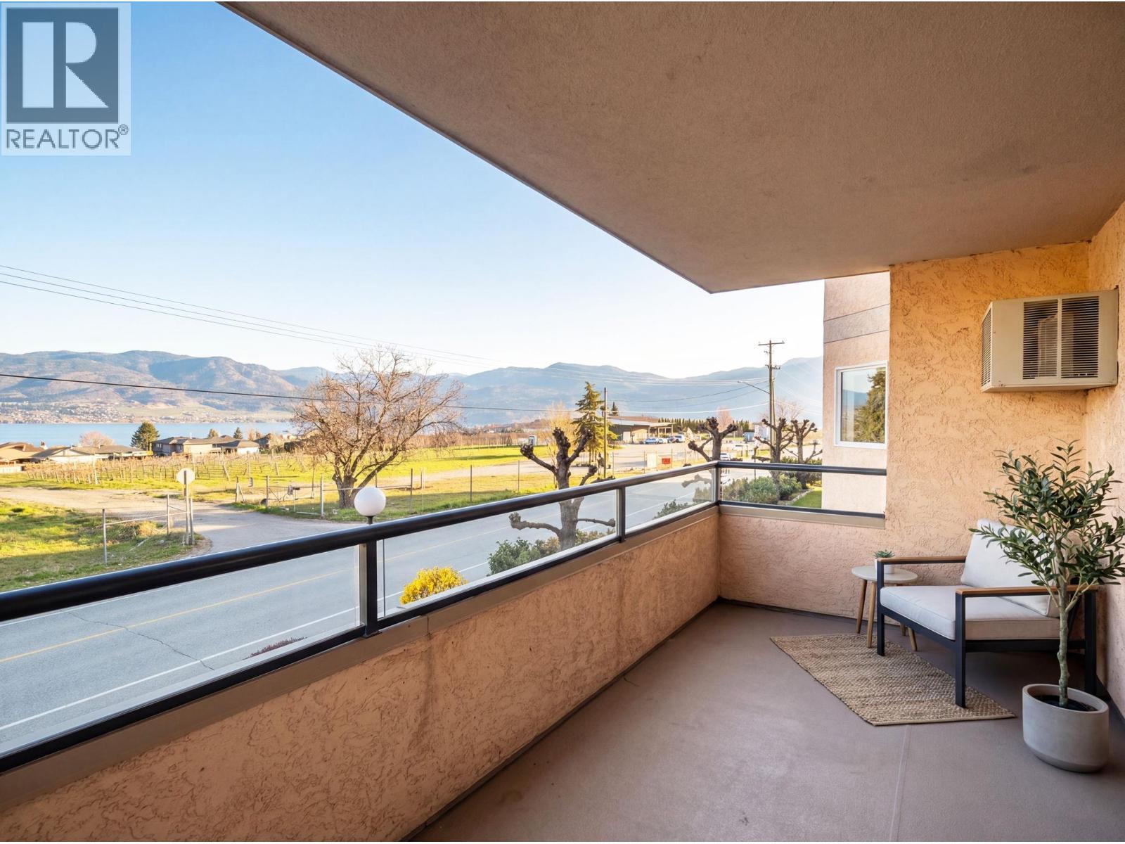 3850 Brown Road Unit# 203, West Kelowna, BC - Outdoor With Body Of Water With Balcony With View With Exterior