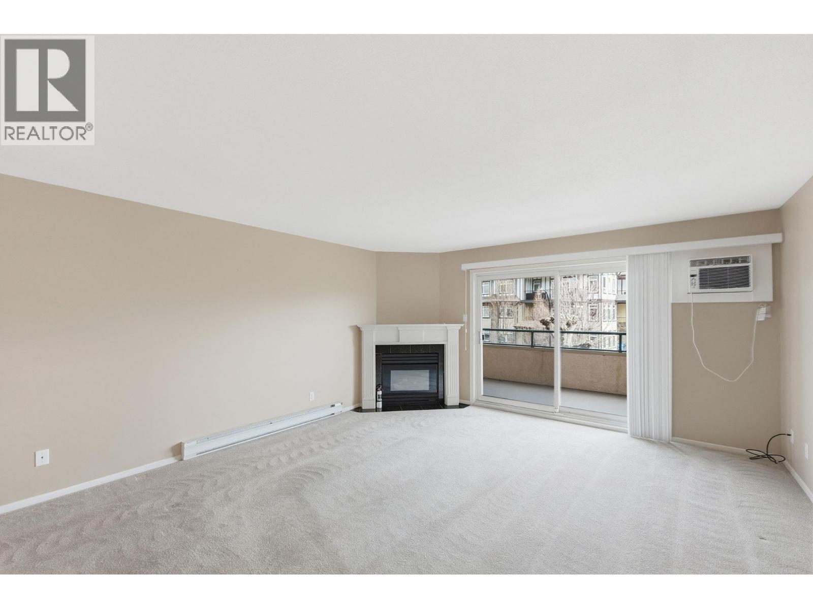 3850 Brown Road Unit# 203, West Kelowna, BC - Indoor With Fireplace
