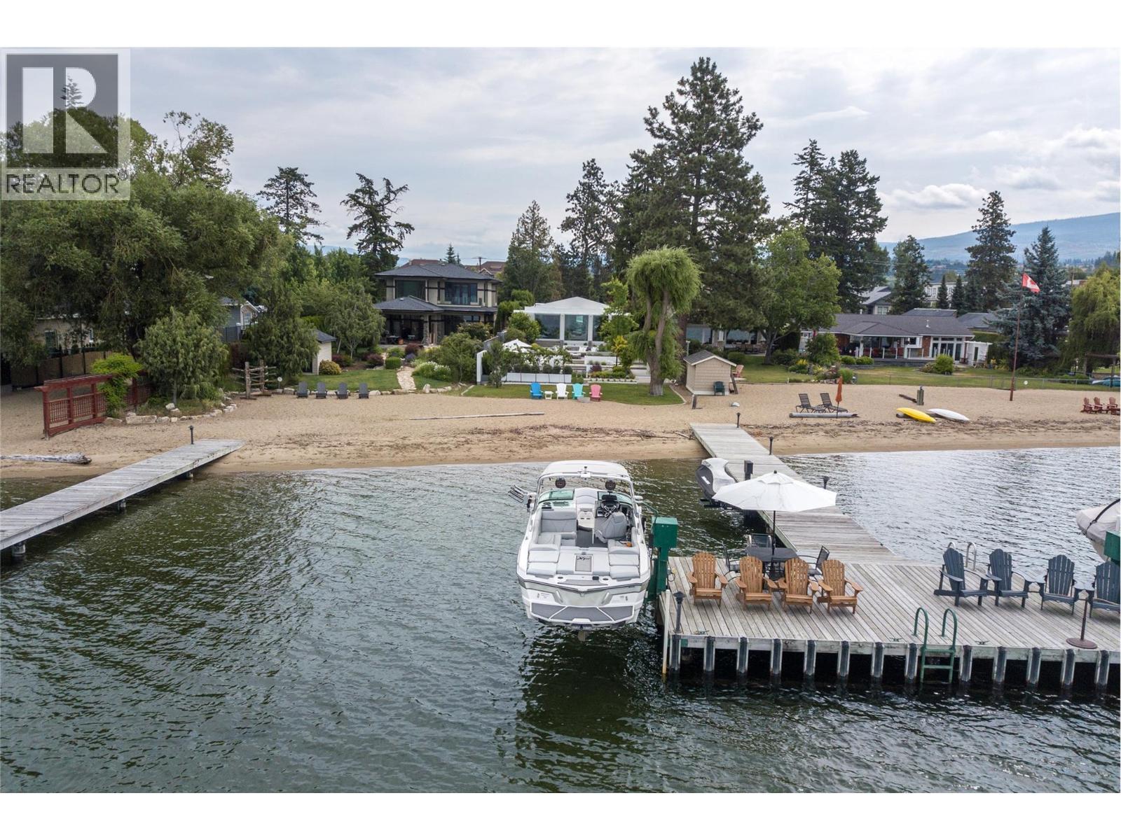 Boat lift holds 6000 lbs - 4110 Lakeshore Road, Kelowna, BC - Outdoor With Body Of Water