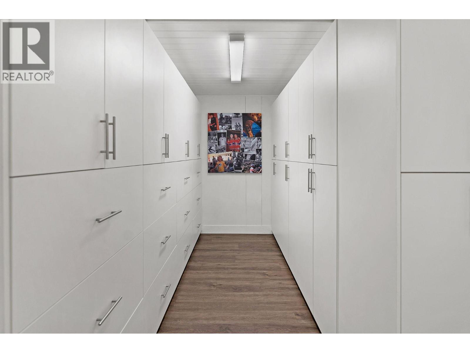 Storage in laundry room - 4110 Lakeshore Road, Kelowna, BC - Indoor Photo Showing Other Room