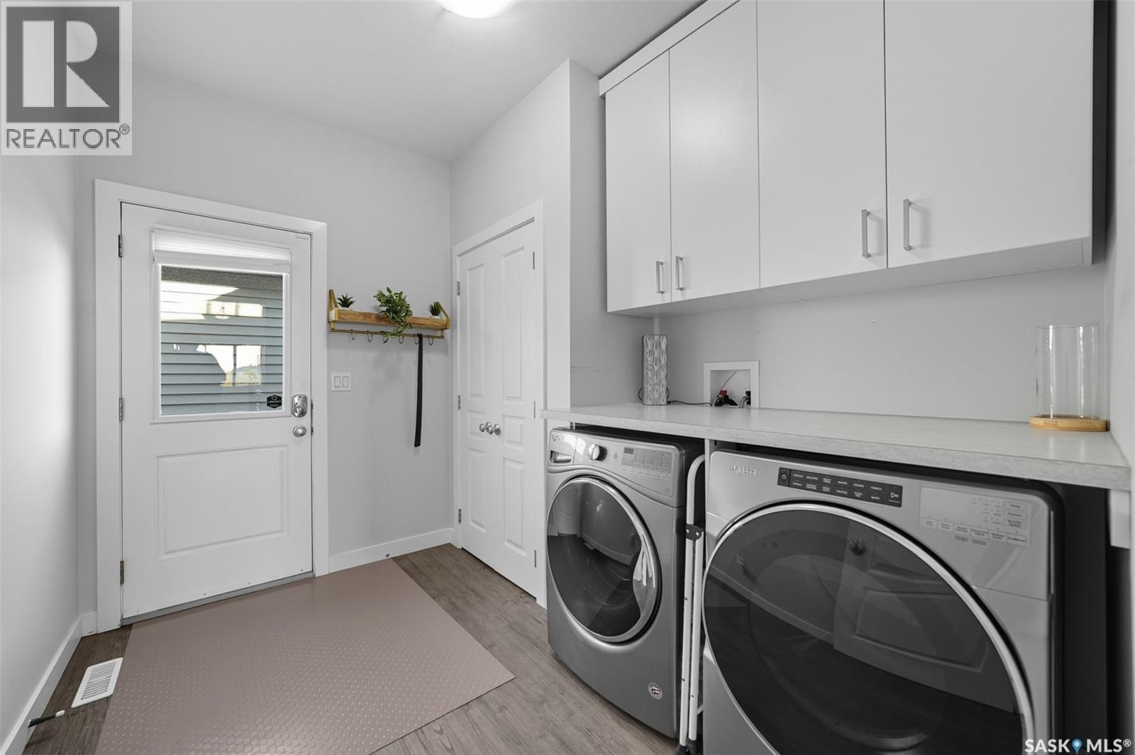 687 Secord Bend, Saskatoon, SK - Indoor Photo Showing Laundry Room