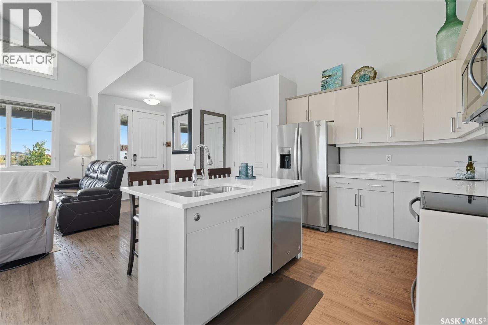 687 Secord Bend, Saskatoon, SK - Indoor Photo Showing Kitchen With Double Sink