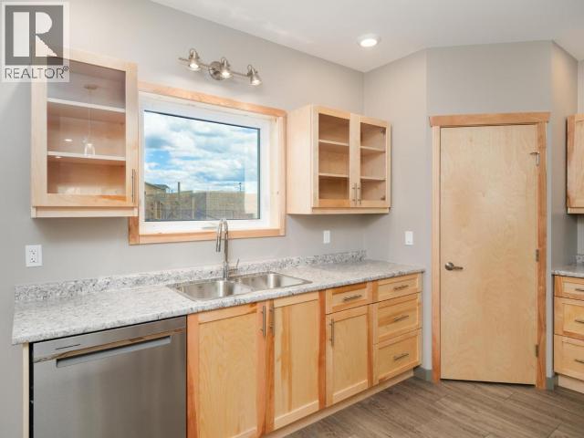 24 Beryl Place, Whitehorse, YT - Indoor Photo Showing Kitchen With Double Sink