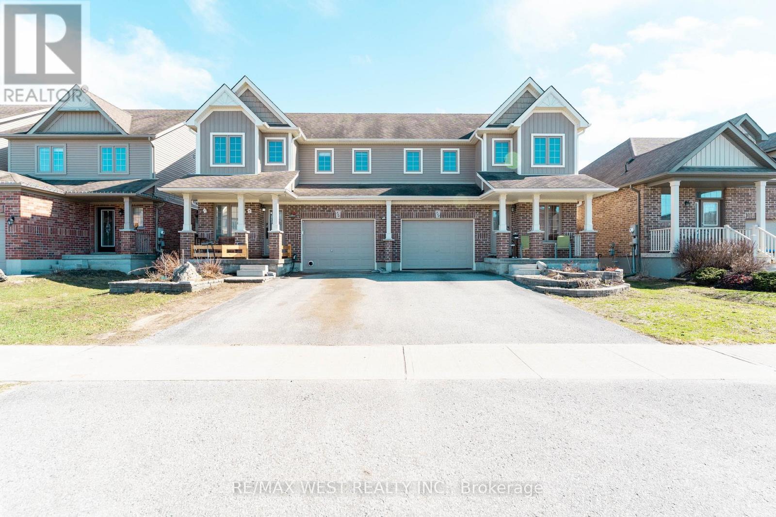 110 Banting Crescent, Essa, ON - Outdoor With Deck Patio Veranda With Facade
