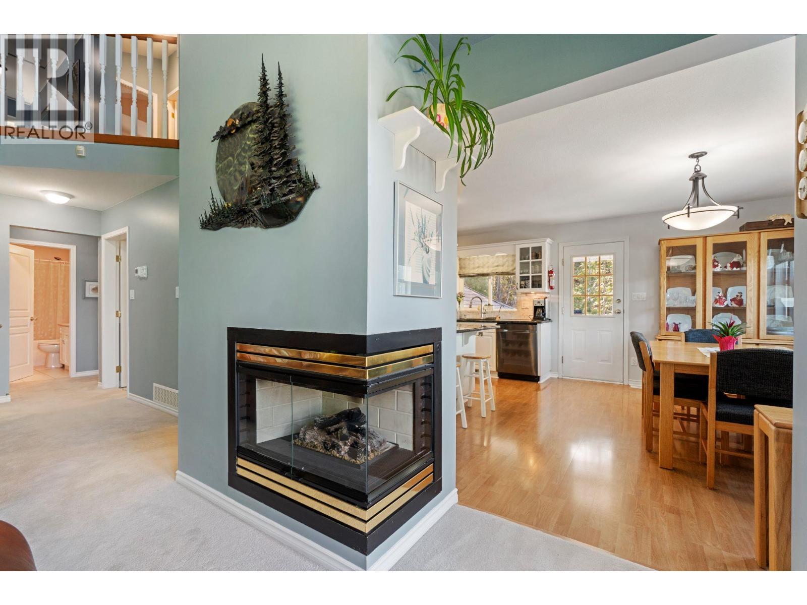 3471 Mcbride Road, Blind Bay, BC - Indoor Photo Showing Living Room With Fireplace