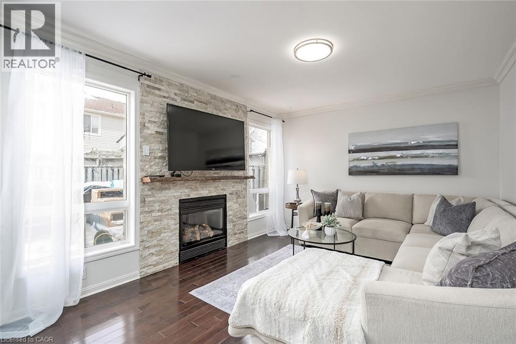 599 Caverhill Crescent, Milton, ON - Indoor Photo Showing Living Room With Fireplace