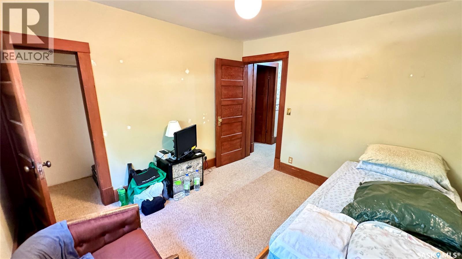 106 2Nd Street E, Dinsmore, SK - Indoor Photo Showing Bedroom