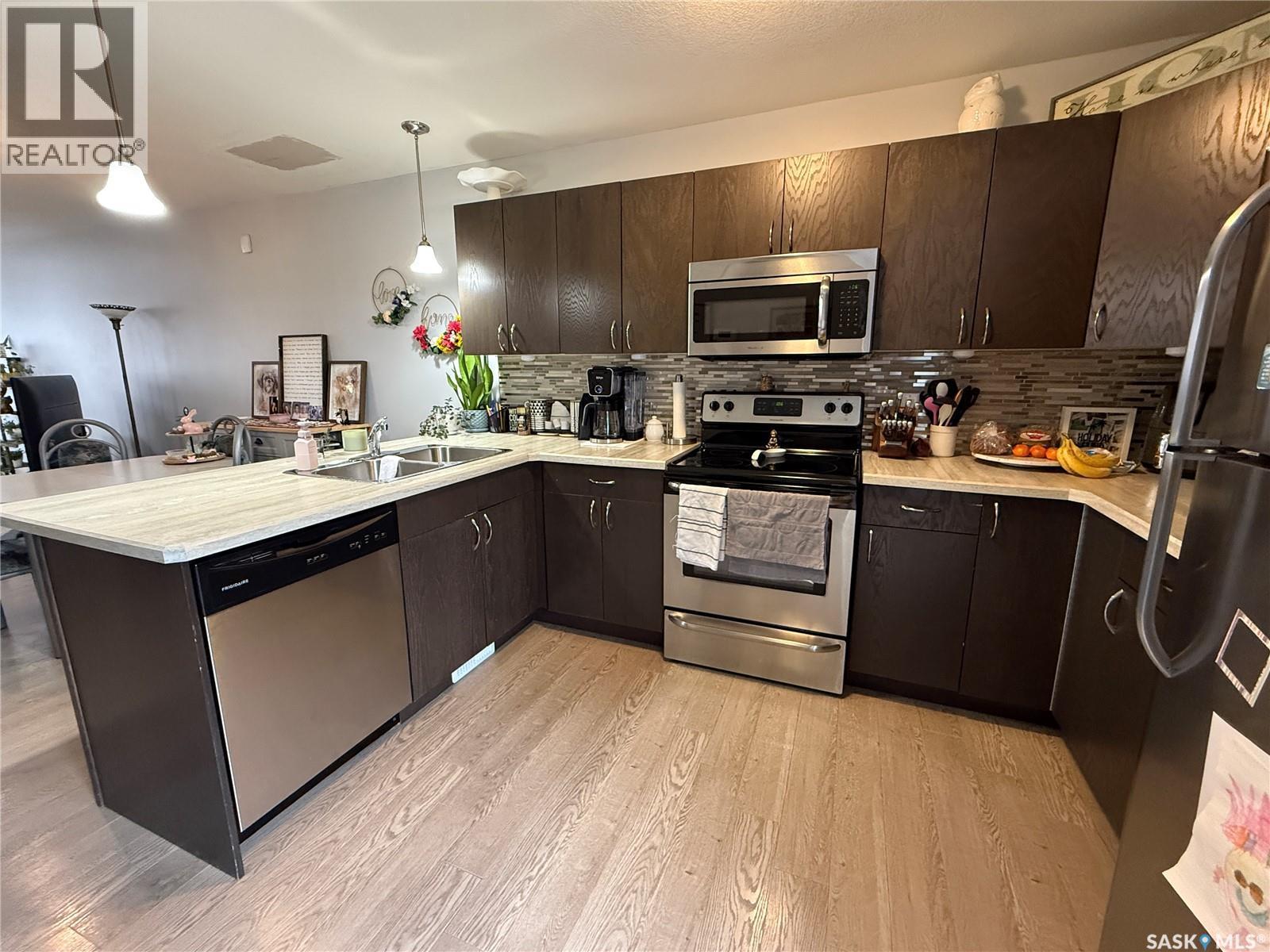 529 Alexandra Street, Weyburn, SK - Indoor Photo Showing Kitchen With Double Sink