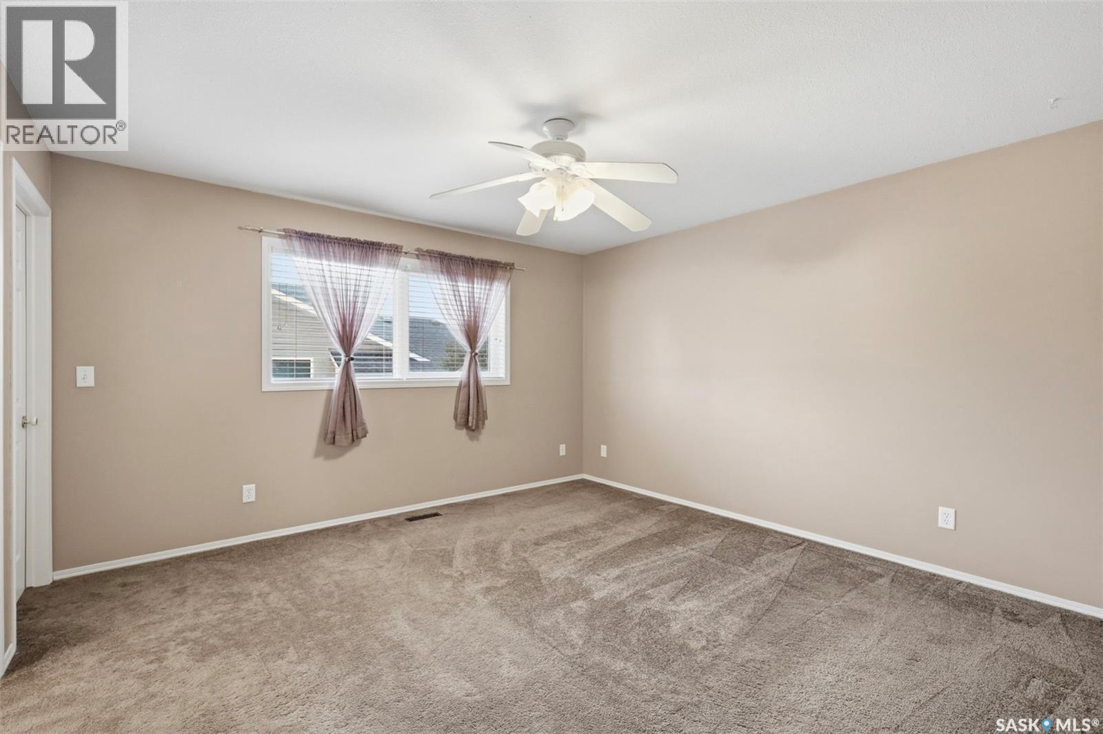 106 Lashyn Cove, Saskatoon, SK - Indoor Photo Showing Other Room