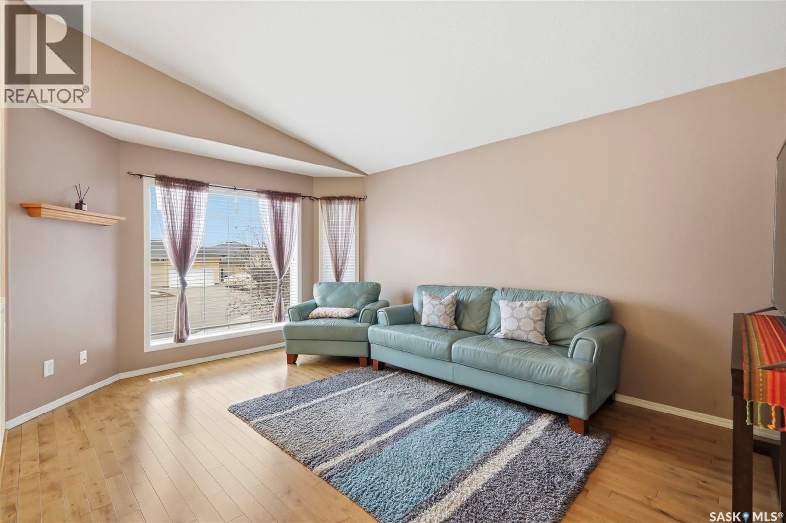 106 Lashyn Cove, Saskatoon, SK - Indoor Photo Showing Living Room