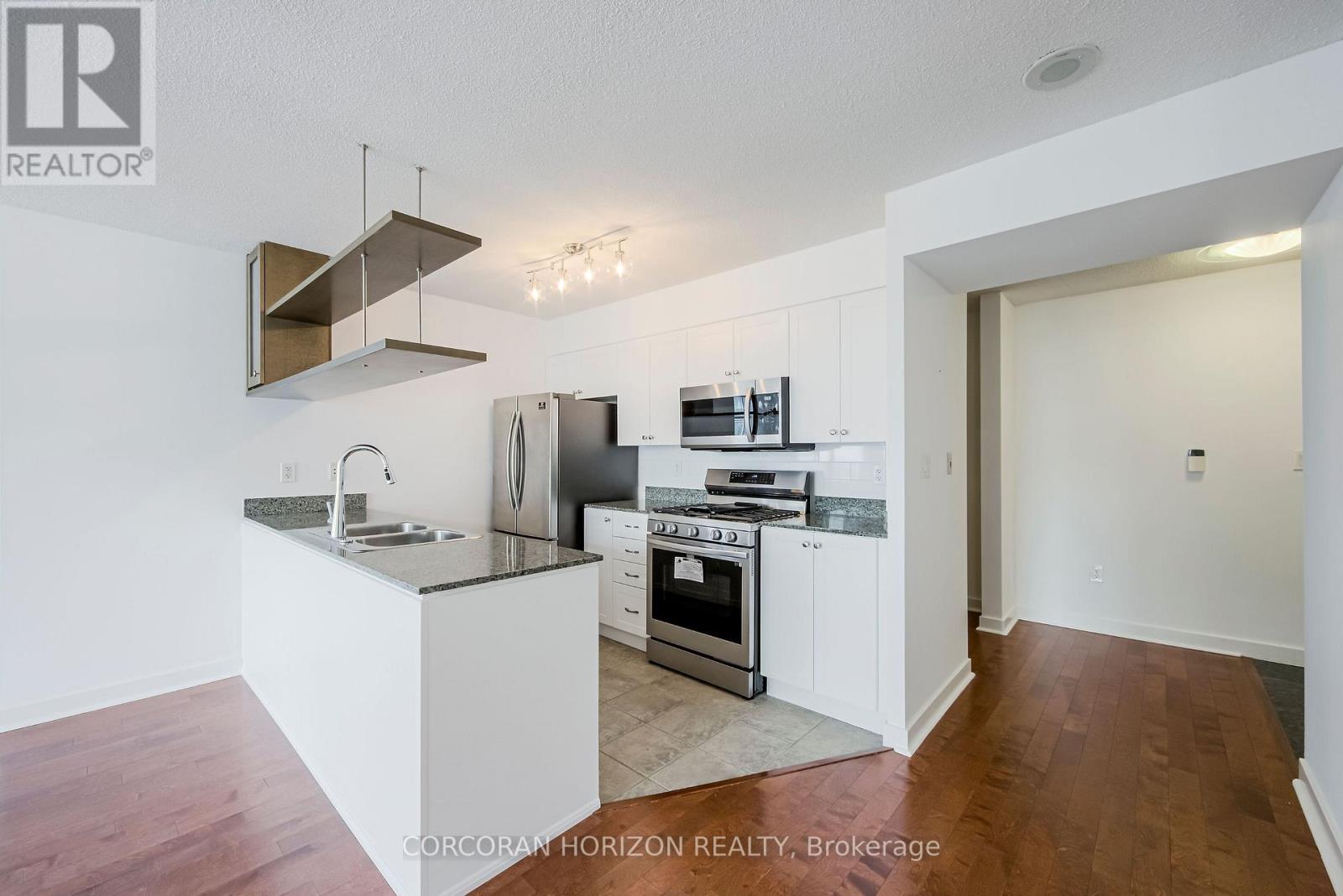 609 - 10 Navy Wharf Court, Toronto, ON - Indoor Photo Showing Kitchen With Double Sink