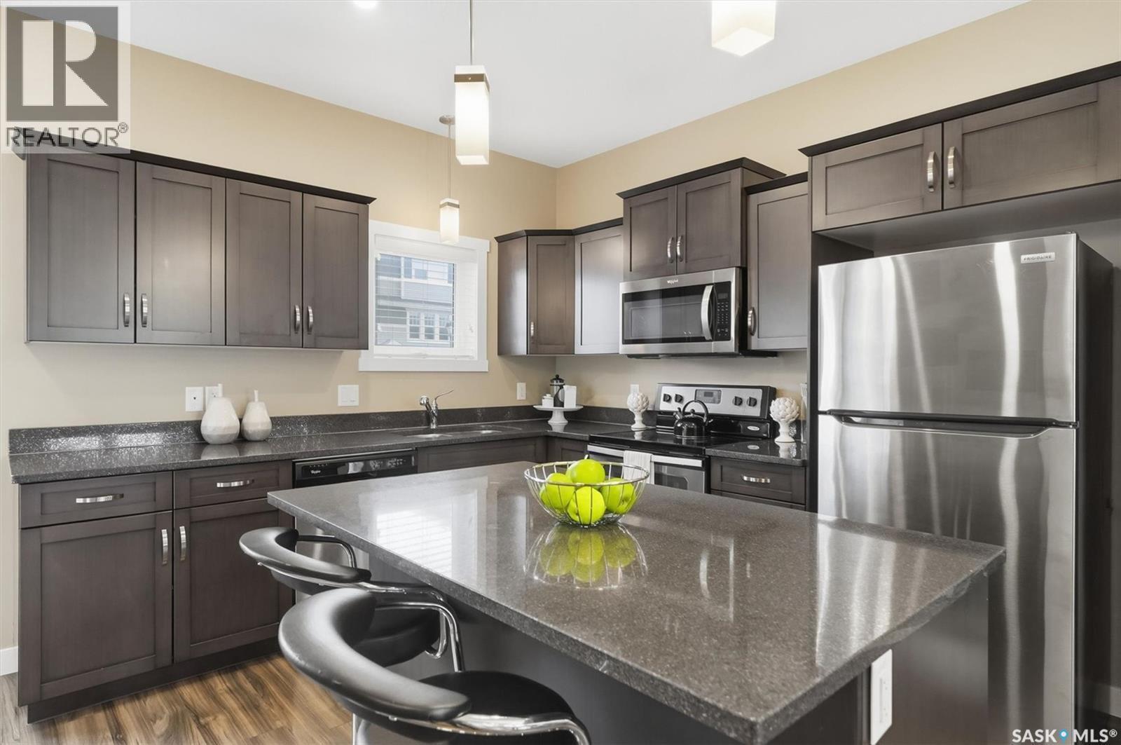 1216 Pringle Way, Saskatoon, SK - Indoor Photo Showing Kitchen With Double Sink