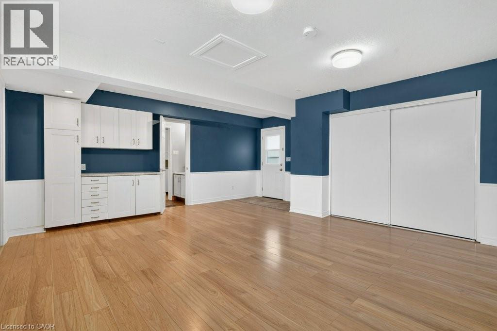 The garage is currently set up as a Family Room complete with separate heating and separate entrance. - 54 Deerwood Crescent, Kitchener, ON - Indoor