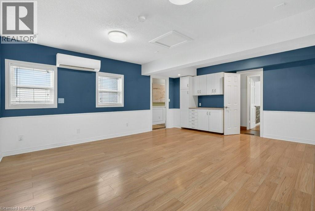 The garage is currently set up as a Family Room complete with separate heating and separate entrance. - 54 Deerwood Crescent, Kitchener, ON - Indoor Photo Showing Other Room