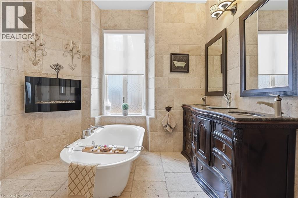 26 Ravenscliffe Avenue, Hamilton, ON - Indoor Photo Showing Bathroom With Fireplace