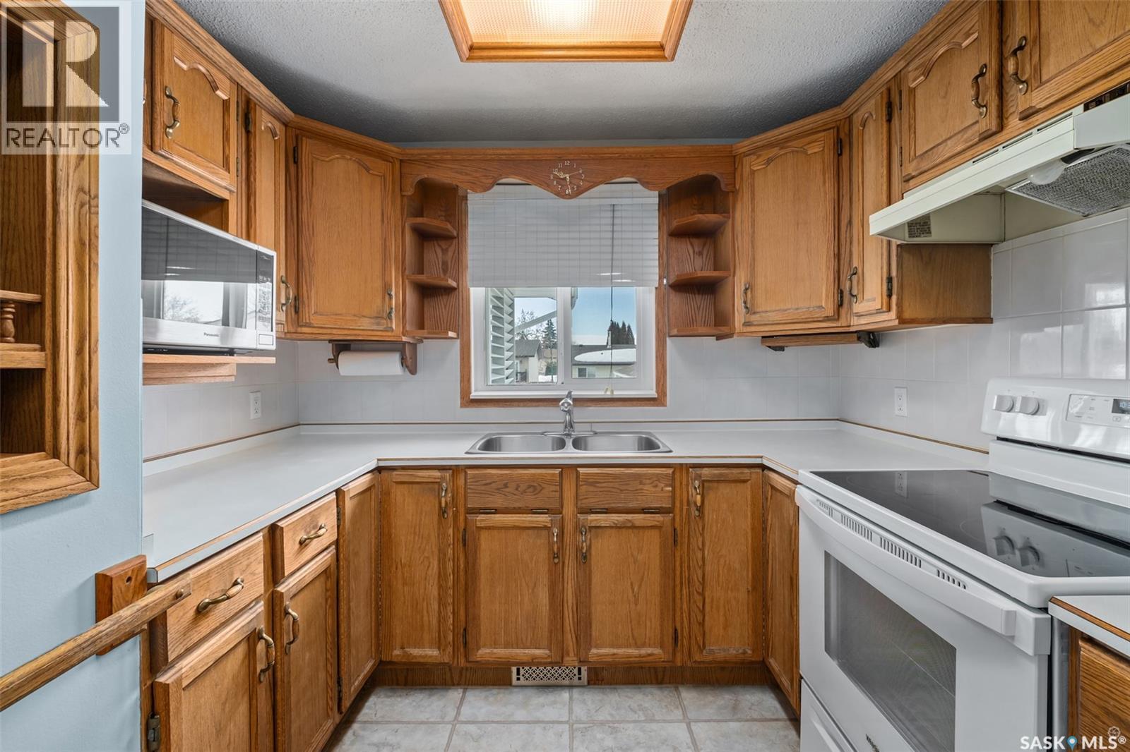3113 Dunn Drive, Prince Albert, SK - Indoor Photo Showing Kitchen With Double Sink