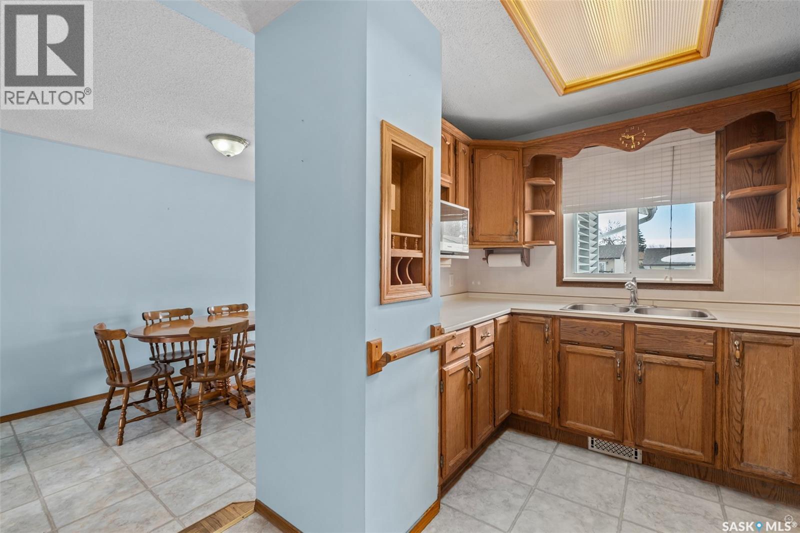 3113 Dunn Drive, Prince Albert, SK - Indoor Photo Showing Kitchen With Double Sink