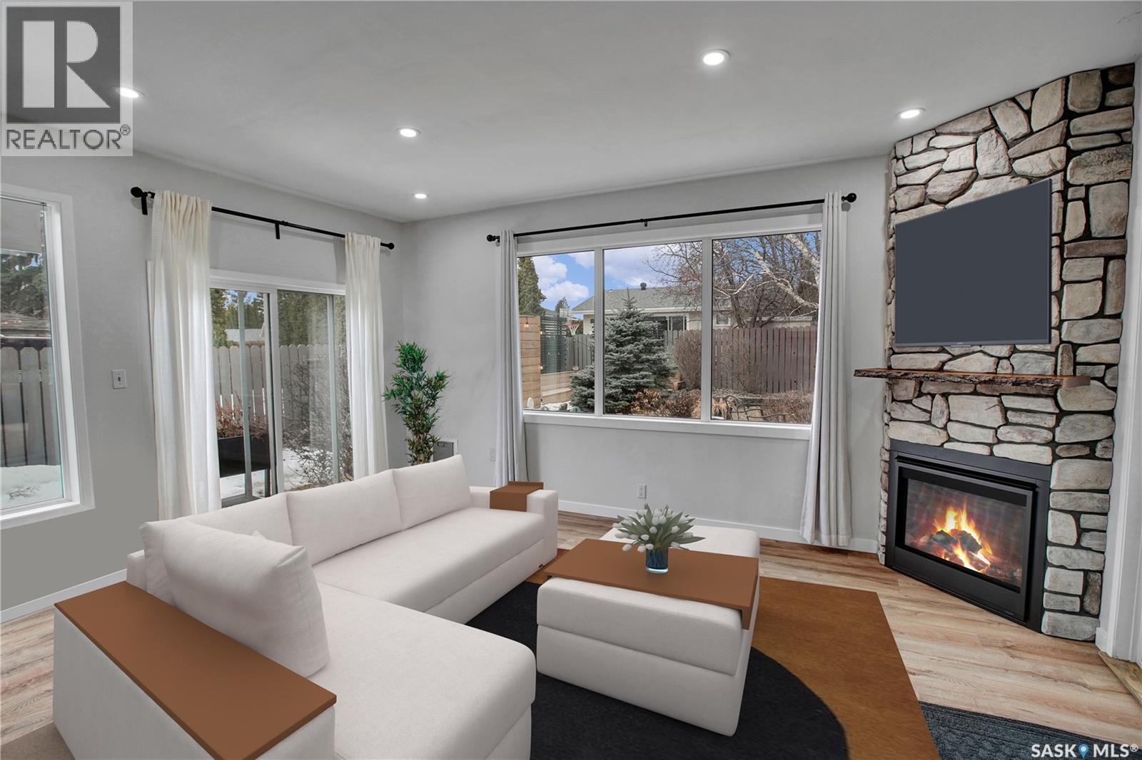 226 Candle Crescent, Saskatoon, SK - Indoor Photo Showing Living Room With Fireplace