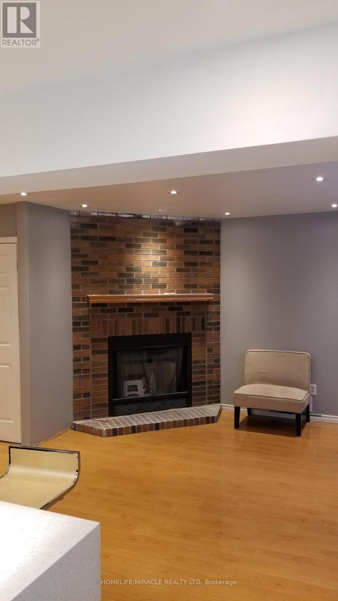 487 Wallenberg Crescent, Mississauga, ON - Indoor Photo Showing Living Room With Fireplace