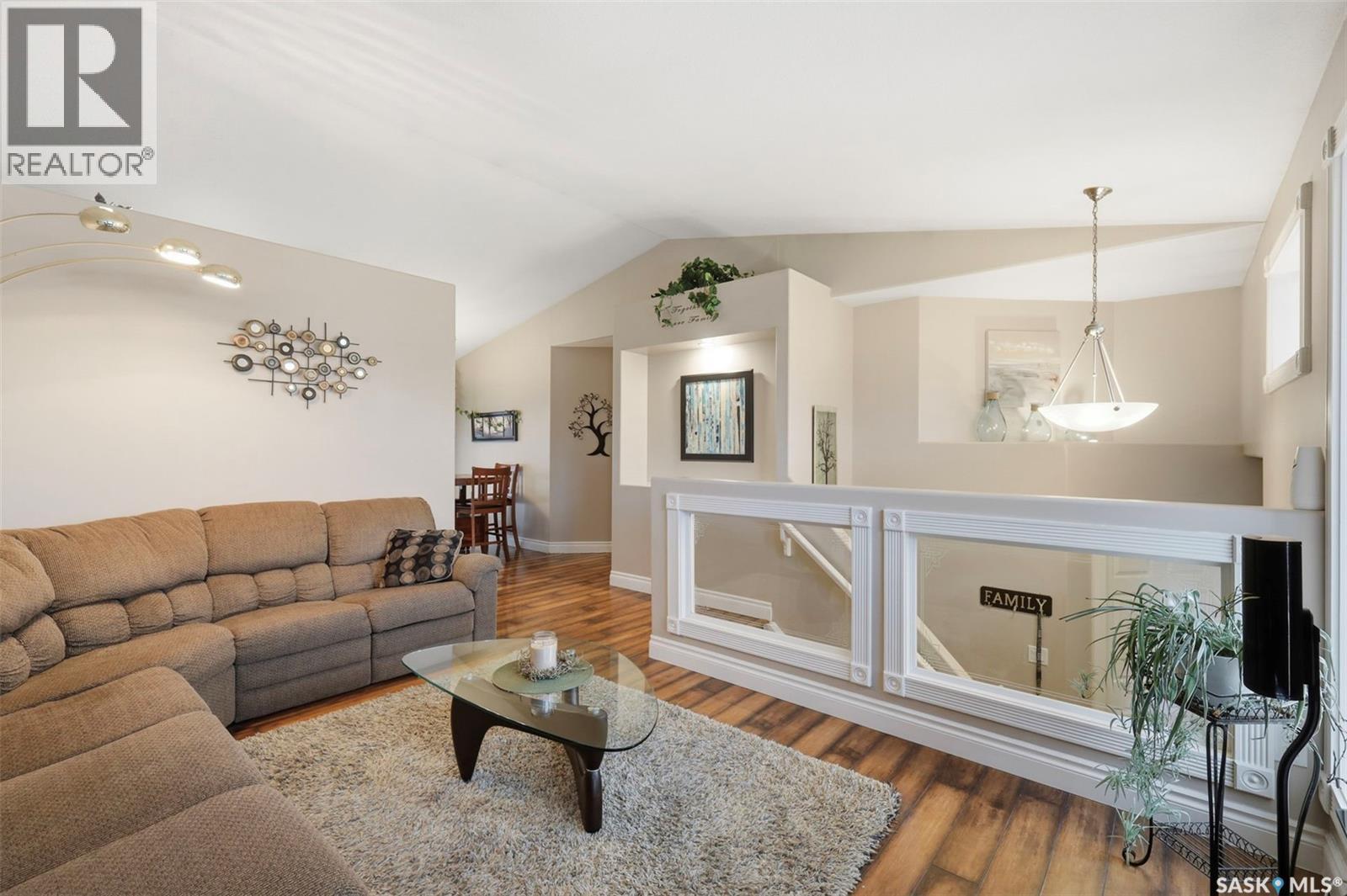 402 Overholt Crescent, Saskatoon, SK - Indoor Photo Showing Living Room With Fireplace