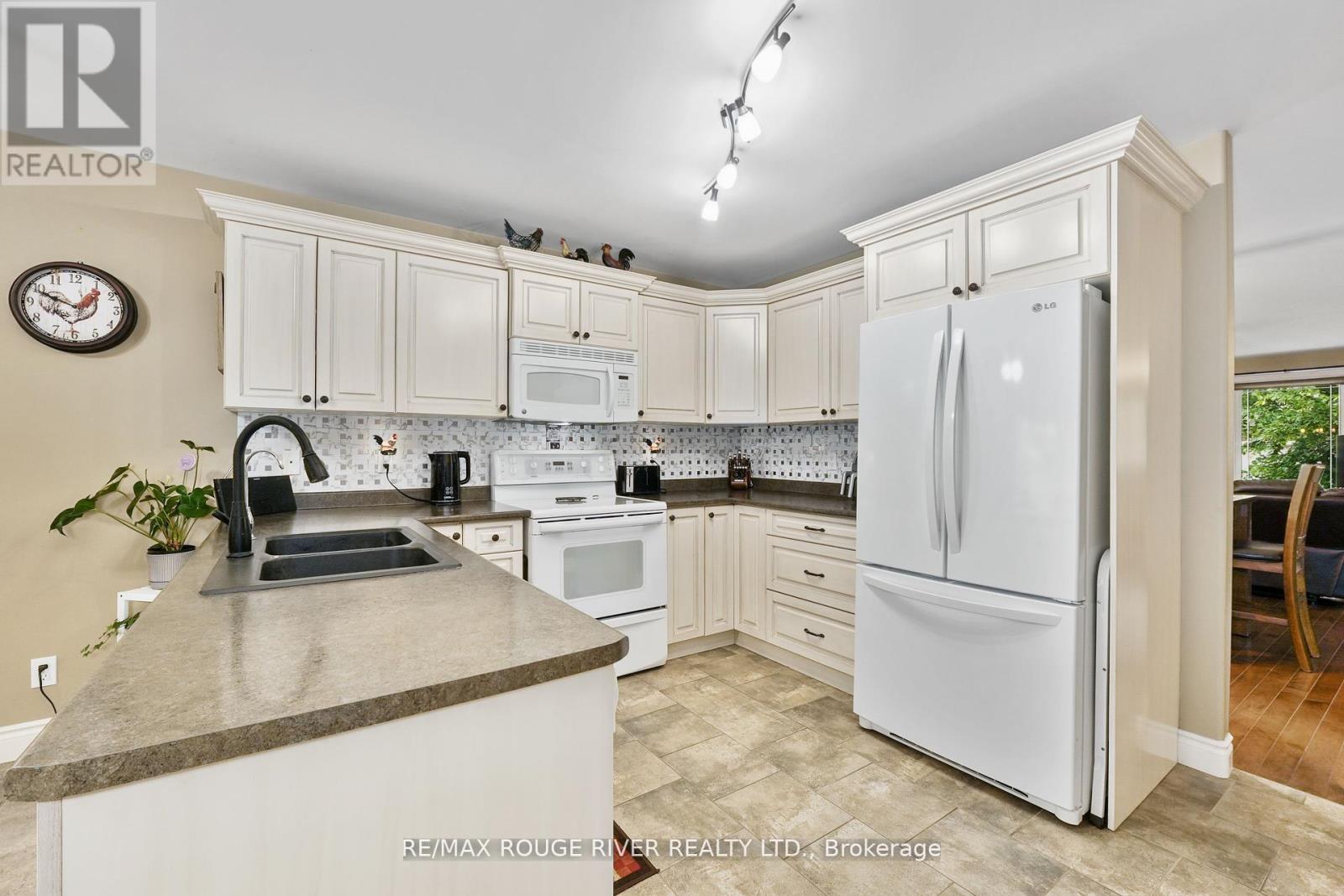 14 Algonquin Avenue, Brighton, ON - Indoor Photo Showing Kitchen With Double Sink