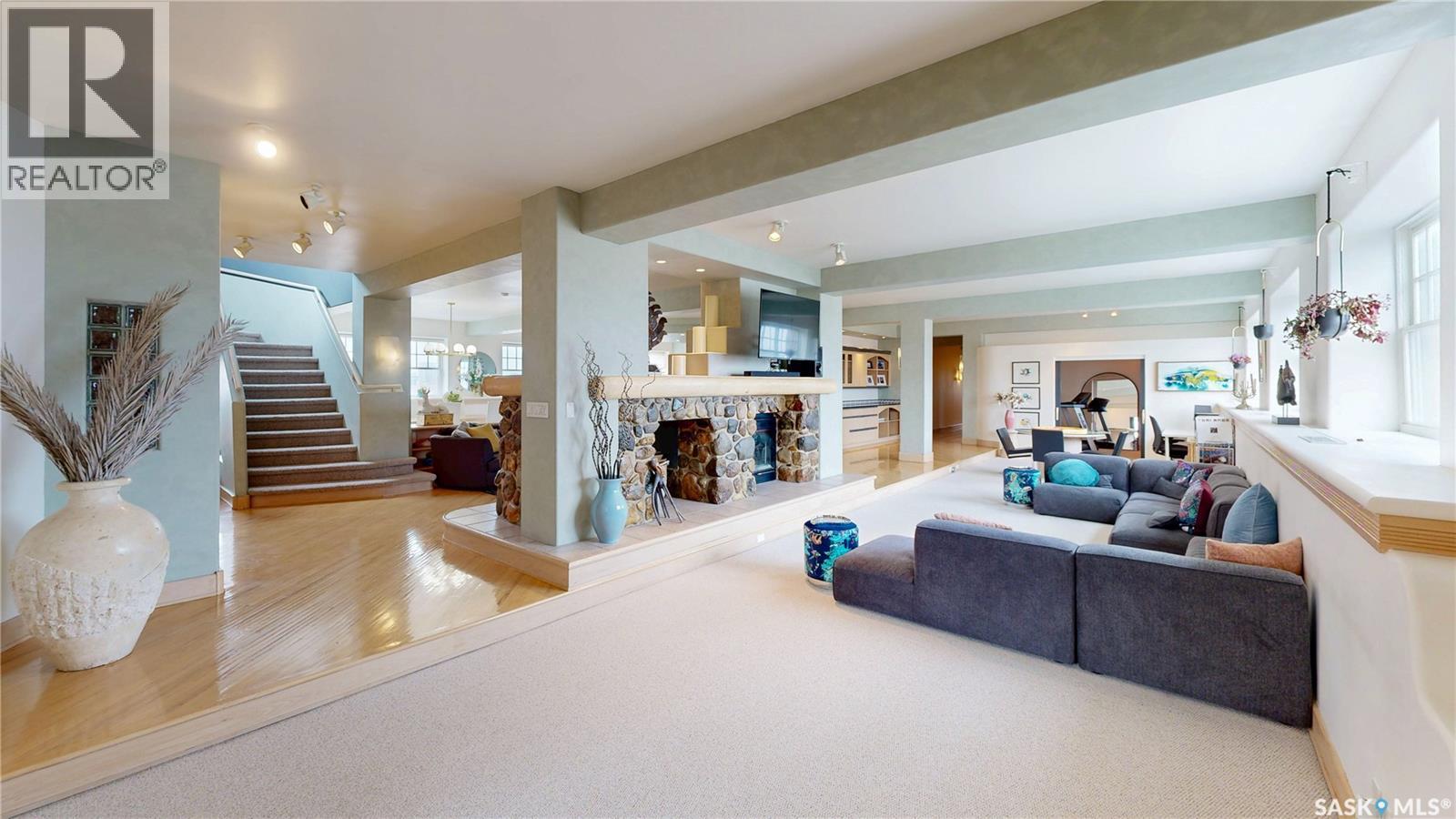 400 1150 Rose Street, Regina, SK - Indoor Photo Showing Other Room With Fireplace