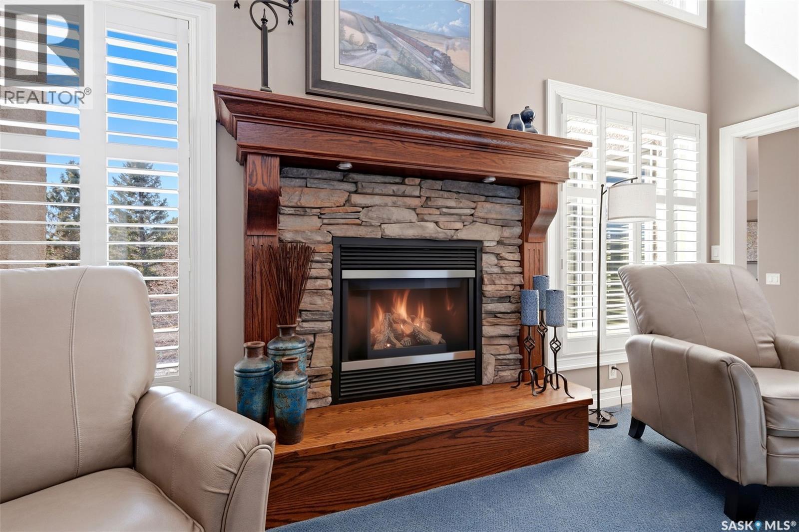 1514 Lakeridge Drive N, Regina, SK - Indoor Photo Showing Living Room With Fireplace